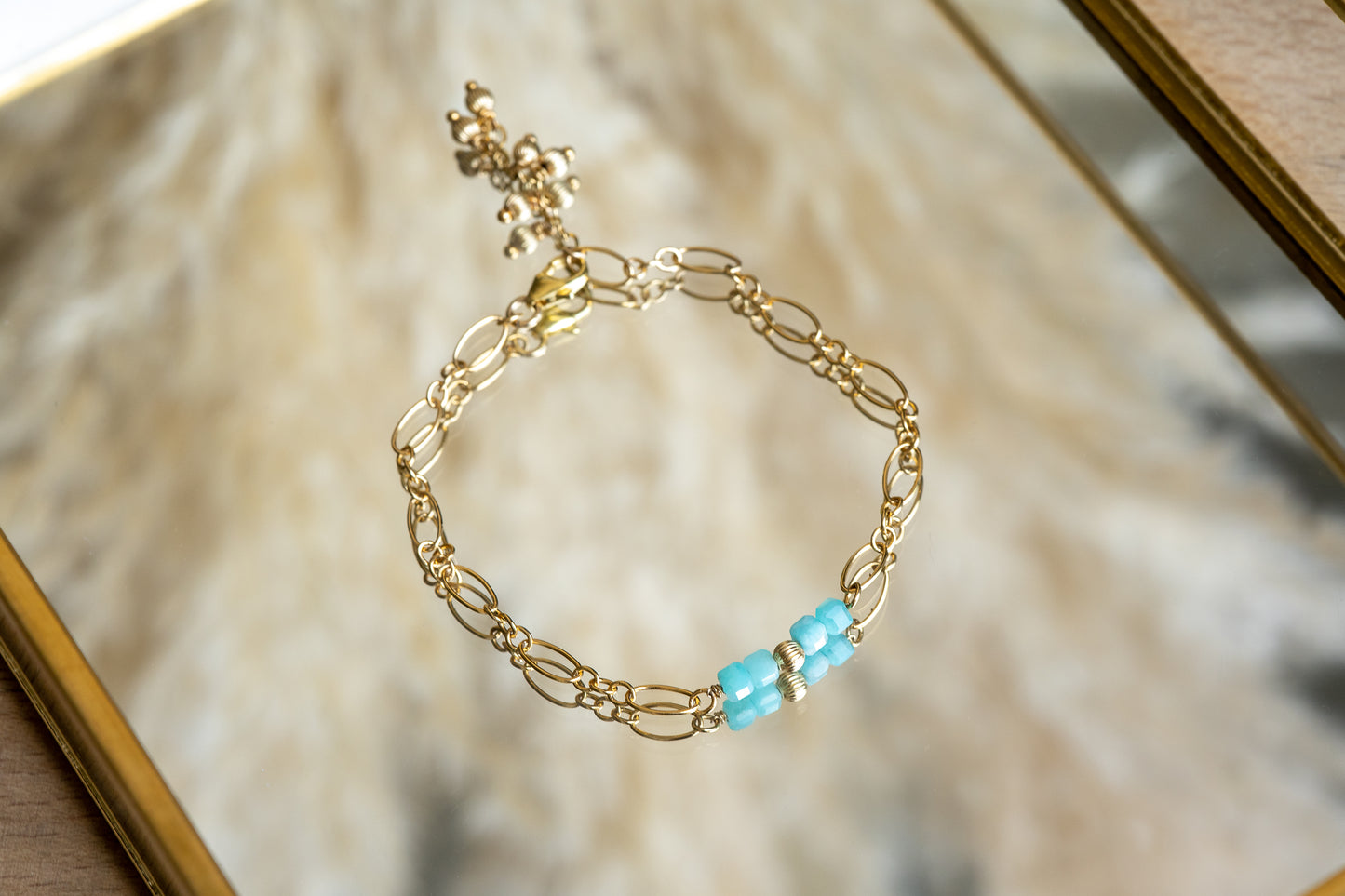 Bracelet pierres turquoises et dorés