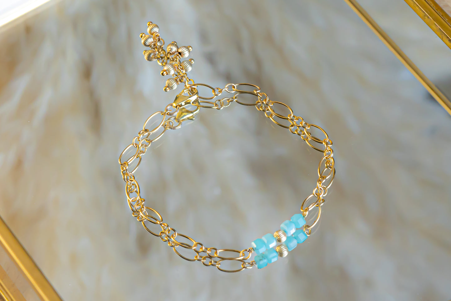 Bracelet pierres turquoises et dorés