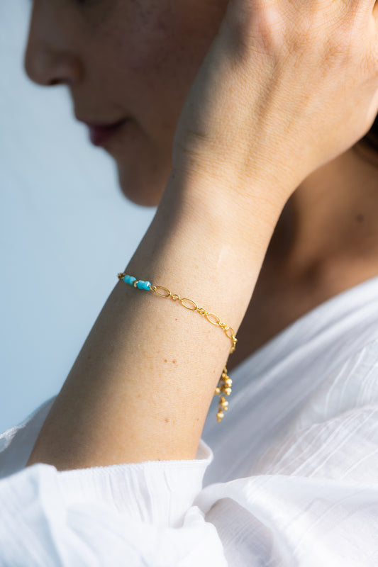 Bracelet pierres turquoises et dorés